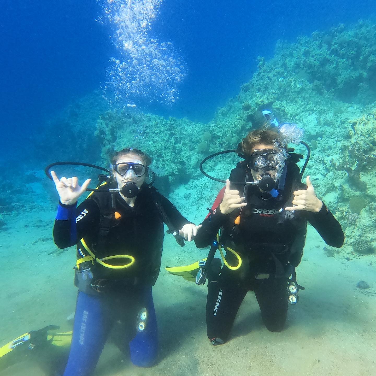 Lucas and a dive buddy underwater